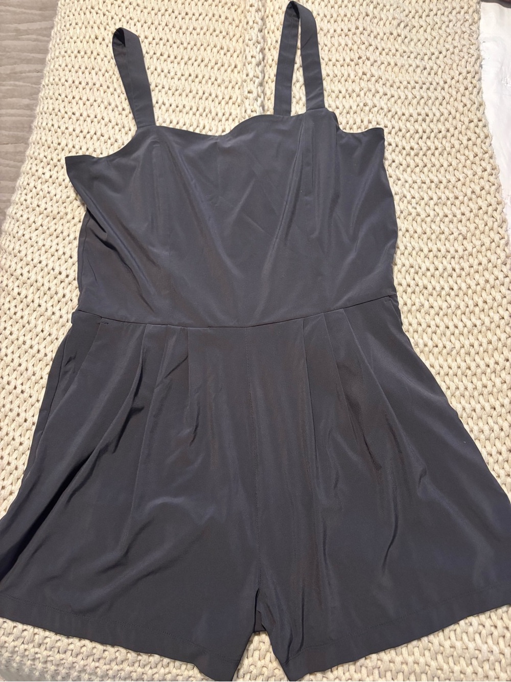 Vuori Black Sleeveless Romper with Zip Detail